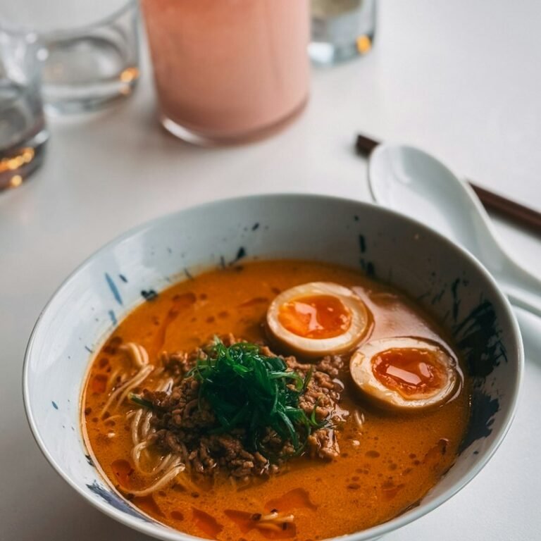 Bowl of ramen with egg and spring onion