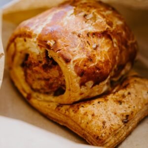Sausage roll in a paper bag